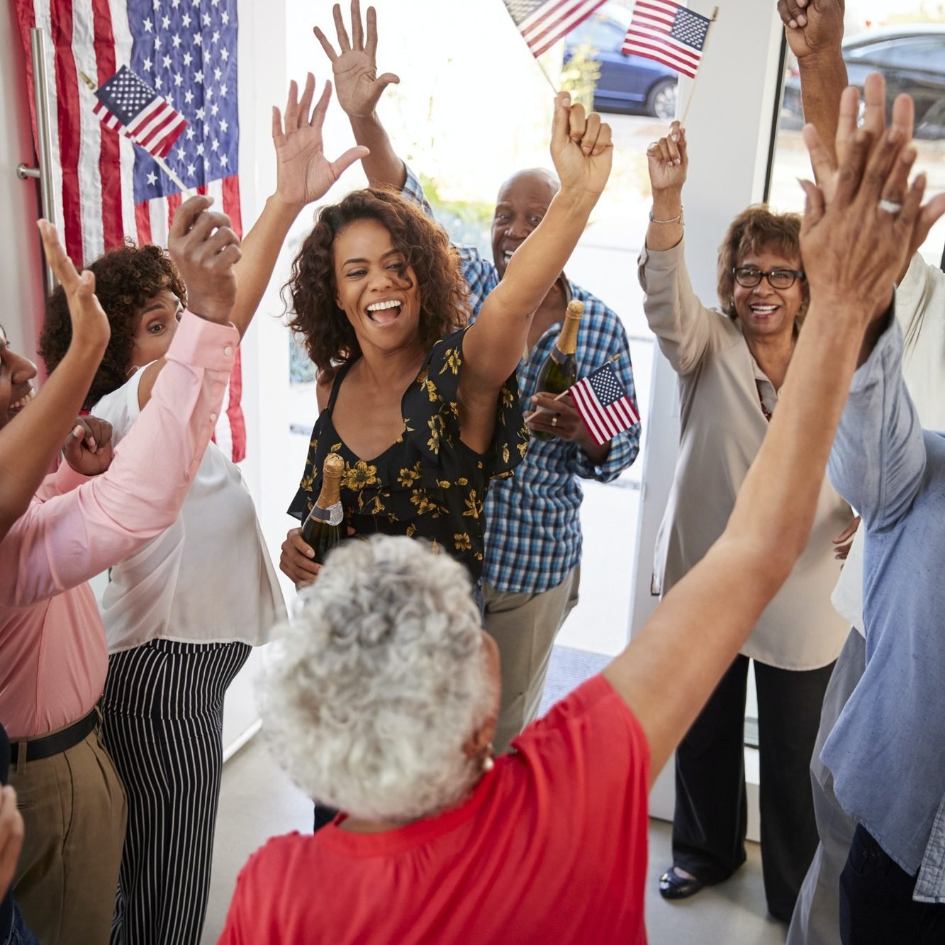 three-generation-black-family-celebrating-independence-day-together-at-home-elevated-view.jpg